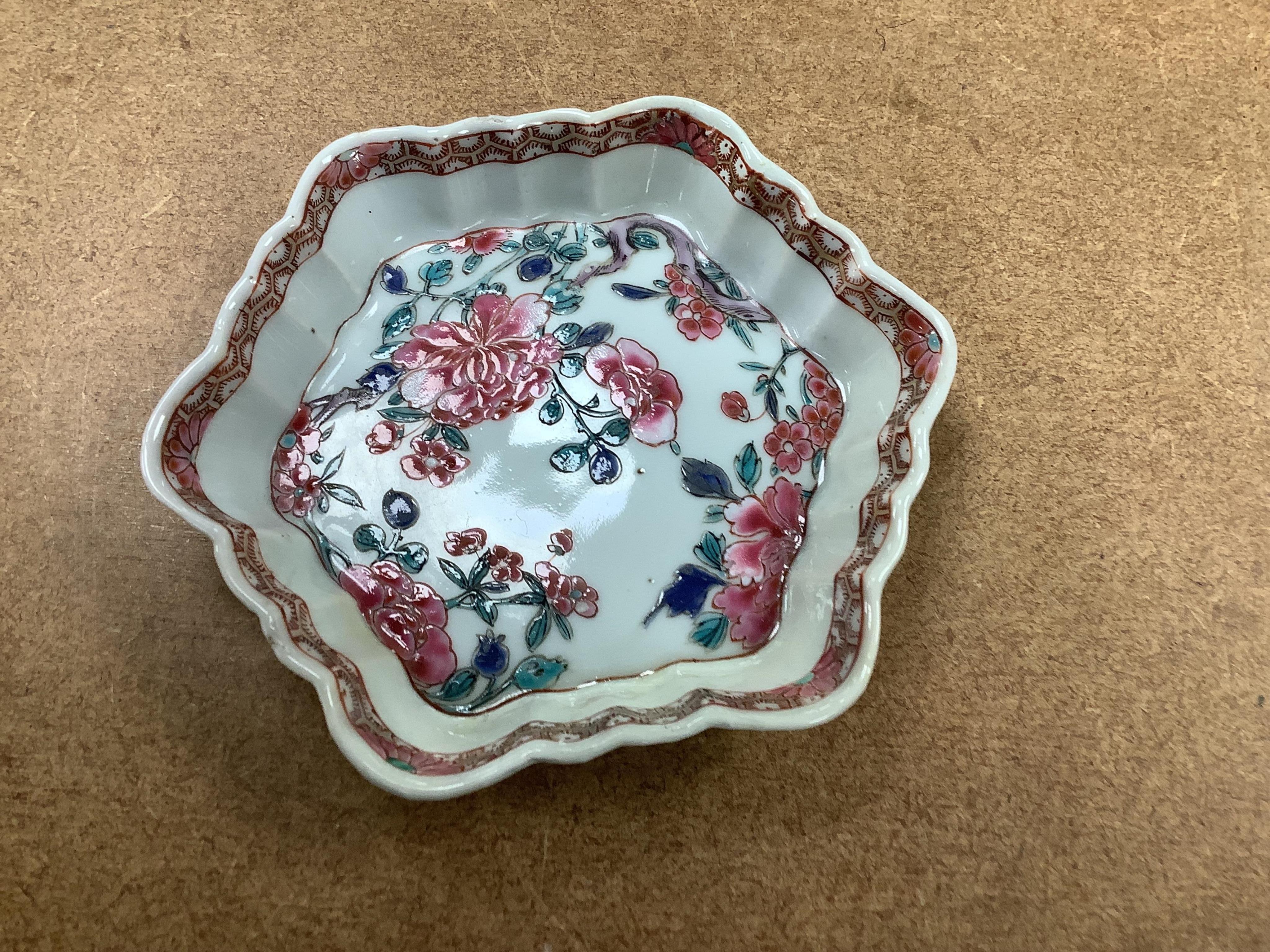 A Chinese blue and white bowl, Kangxi, 15cm. diam., a famille rose teapot stand, Yongzheng, and two doucai bowls. Condition - varies